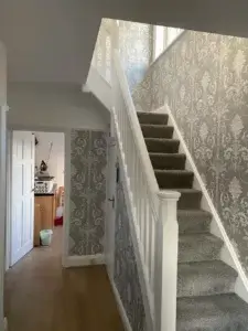 Hall Stairs and Landing Wallpapered With Laura Ashley Wallpaper Called Josette Steel